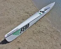 Fenn Swordfish, bow quarter on the sand, SWORDFISH decal visible