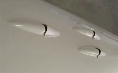 Red7 Surf70 Pro — close-up of the three bullet-scupper drains